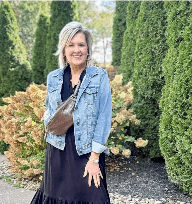 Tania wearing a denim jacket with a chocolate brown belt bag